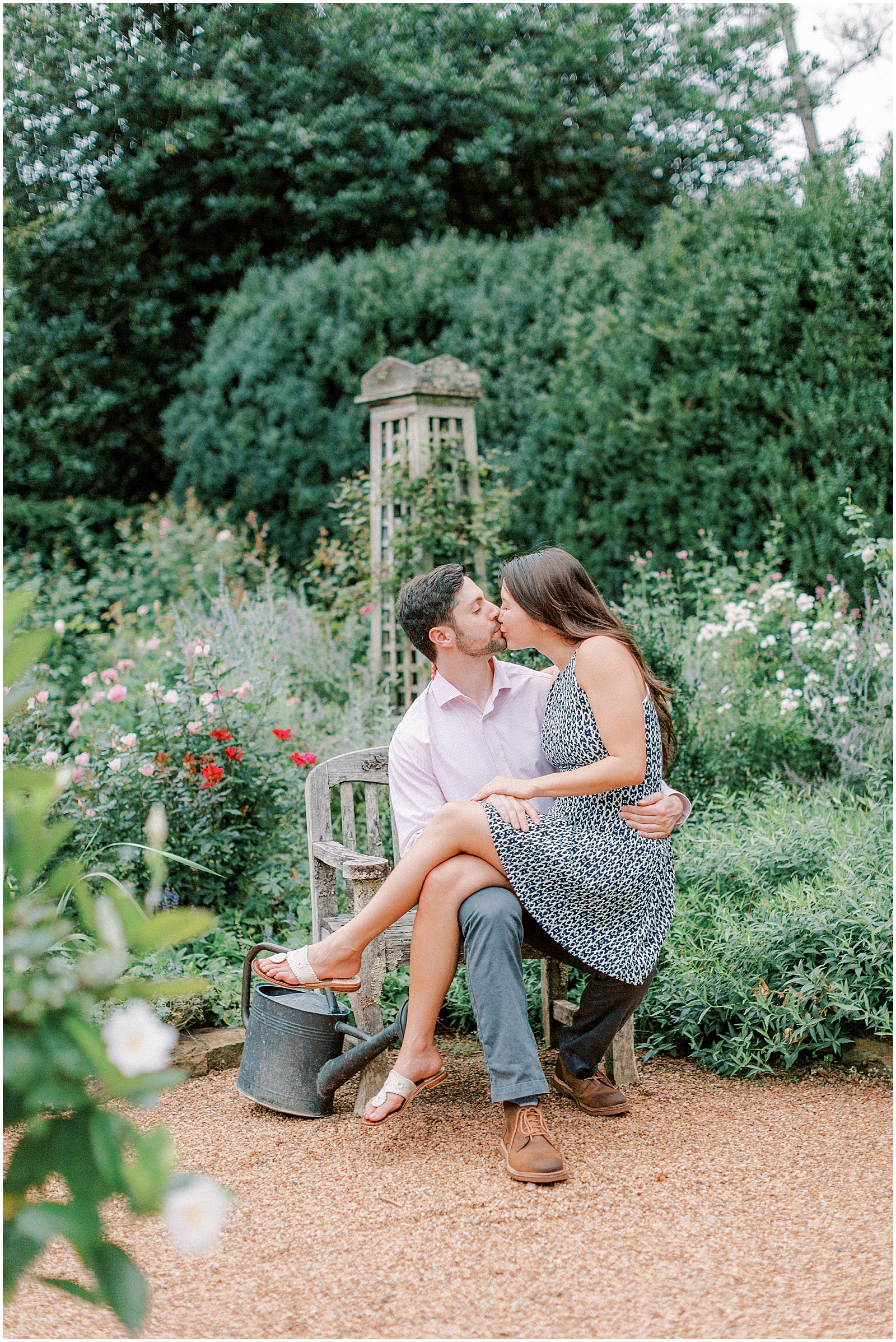 couple sitting in garden - engagement session